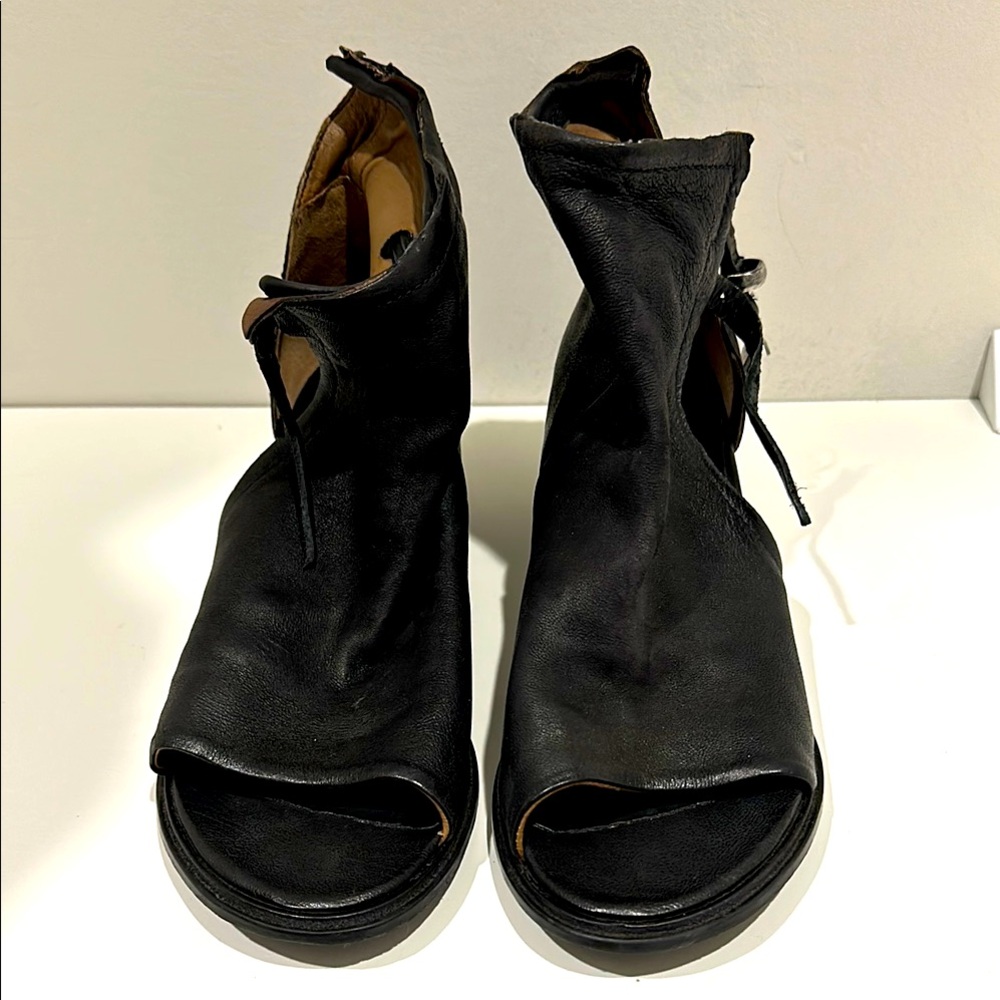 Black leather open toe and side boot
